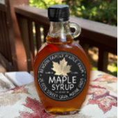 Étiquette de sirop d'érable noir avec feuille d'ér