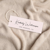 Étiquette de vêtements rose code QR de l'écriture 