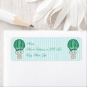 Étiquette Eléphant de bébé bleu turquoise dans un ballon à a (En situation)