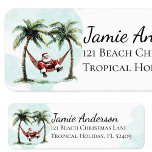 Étiquette Fun Beach Père Noël Tropical Christmas Return Adre<br><div class="desc">Épices vos mailings de vacances côtières avec ce design fantastique de plage d'aquarelle de Noël! Le Père Noël redonne son costume rouge sur un hamac entre deux palmiers. C'est le moyen idéal pour apporter une touche de gaieté tropicale à vos Bonnes Fêtes.</div>