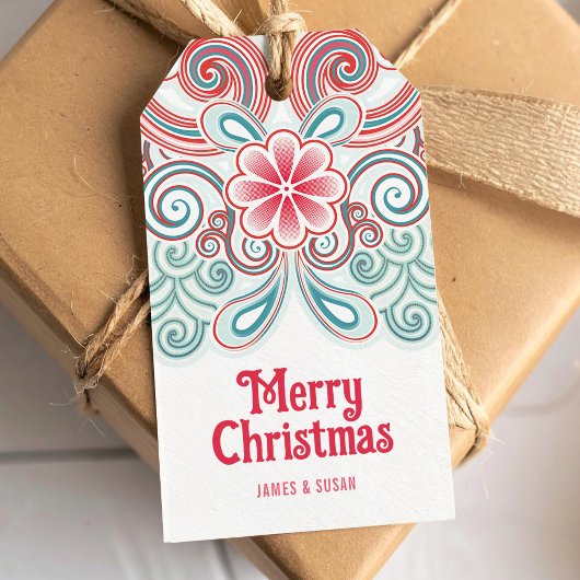 étiquette Joyeux Noël avec fleurs rouges et vertes