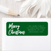Étiquette Joyeux Noël vert script retour adresse (En situation)