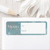 Étiquette Joyeux turquoise et flocons de neige brillants de (En situation)