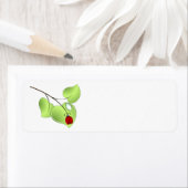 Étiquette Ladybug avec trois feuilles et une goutte (En situation)