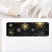 Étiquette Les flocons dorés de Noël sur l'Arrière - plan noi (En situation)