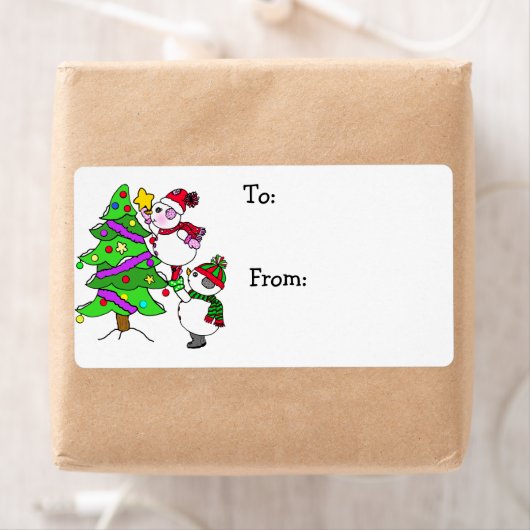 Étiquette Les neigeurs de Noël décorent l'arbre à destinatio (En situation)