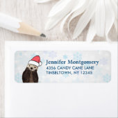 Étiquette Mignonne Otter portant un chapeau de Père Noël (En situation)