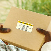 Étiquette Nom de l'entreprise mis en évidence sur une étique