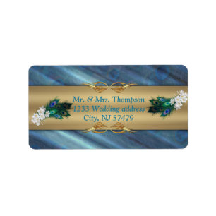 Étiquette Or, plumes de paon sur soie vert émeraude