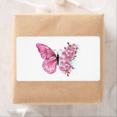Étiquette Papillon à fleurs avec Sakura rose (En situation)