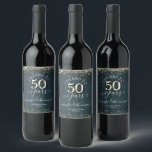 Étiquette Pour Bouteilles De Vin Élégant Gold 50th Birthday Script<br><div class="desc">Jolie parties scintillant en faux or,  faits saillants sur la bordure supérieure et inférieure. Tout le texte est ajustable et facile à changer pour vos besoins de partie. Grand élégant design modèle 50e anniversaire. arrière - plan texturé en bois bleu.</div>