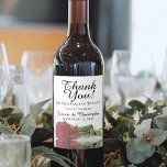 Étiquette Pour Bouteilles De Vin Elegant Reflecting Red Rose Wedding Thank You<br><div class="desc">These beautiful wine bottle labels are the perfect addition to your wedding celebration. The design features a single long stemmed red rose reflecting in a pool of water with ripples and waves. The caption reads: Thank you for celebrating with us. There is space for the wedding couple's names, the wedding...</div>