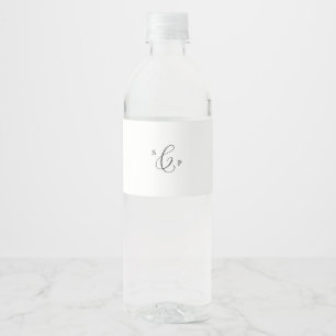 Étiquette Pour Bouteilles D'eau Mariage de monogramme de calligraphie noire délica