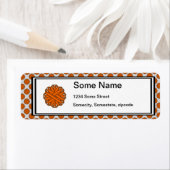 Étiquette Ruban aux fleurs orange par Kenneth Yoncich (En situation)