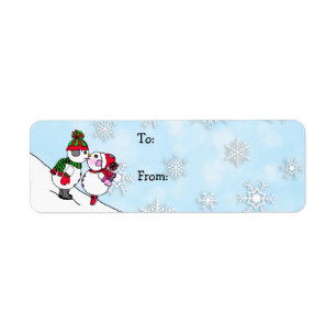 Étiquette Snowmen de Noël et femme s'embrasser et de