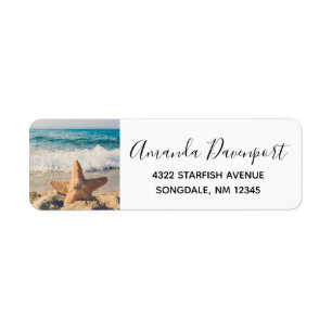 Étiquette Starfish sur une plage de sable Photo