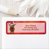 Étiquette Vache Highland à Santa Hat sur Red (En situation)