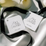 Étiquettes Cadeau Elegant Black & White Love and Thanks Wedding<br><div class="desc">Add a refined finishing touch to your wedding favors with this elegant “Love and Thanks” wedding favor tag. Designed with classic serif typography and a clean white palette, it’s perfect for thank-you gifts, welcome bags, bridal shower favors, and reception details. Part of the RHEA Wedding Collection — follow the link...</div>