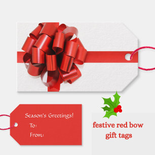 Étiquettes-cadeau Festive Red Bow sur les "Bonnes Fêtes" blanches