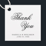 Étiquettes Cadeau Mariage traditionnel noir et blanc Formal élégant<br><div class="desc">Élégante typographie marque de mariage avec un design simple avec le message, "Merci" en calligraphie noire et vos noms et date ci-dessous, sur un arrière - plan blanc. Les polices et les couleurs arrière - plans peuvent être changées en n'importe quelle couleur. Ces étiquettes fantaisie et classe sont parfaites pour...</div>