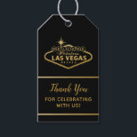 Étiquettes-cadeau Merci Favor Tags Las Vegas Mariage<br><div class="desc">Balises de sac cadeau Gold Las Vegas Affiches de bienvenue et étiquettes de faveur. Cliquez sur CUSTOMISER PLUS loin pour modifier la couleur, les polices et le design de l'arrière - plan et du texte pour obtenir une étiquette cadeau Vegas vraiment personnalisée. Découvrez notre collection complète d'invitations de mariage Vegas...</div>