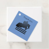 Étiquettes Cadeau Montrez le cavalier qui franchit un obstacle. (En situation)