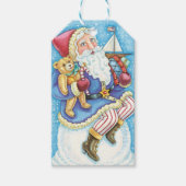 Étiquettes-cadeau Noël mignon, le Père Noël sur Snowball avec jouets (Devant)