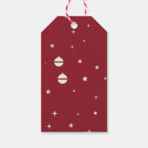 Ornements blancs et étoiles sur fond rouge