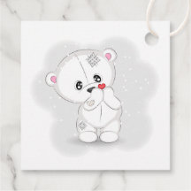 Ours blanc mignon tenant un cœur