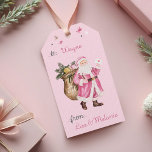 Étiquettes-cadeau Pink Christmas Retro Vintage Santa Claus à De<br><div class="desc">Faites-vous plaisir avec notre étiquette cadeau de Noël rétro personnalisée, une façon charmante d'ajouter une touche de magie rétro à chaque cadeau. Cette étiquette cadeau exquise présente une aquarelle fantaisiste d'un Père Noël rose de style rétro, portant joyeusement un sac de cadeaux et diffusant des réjouissances festives. Ce qui rend...</div>