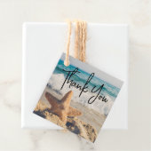 Étiquettes Cadeau Starfish sur une plage de sable Photo (En situation)