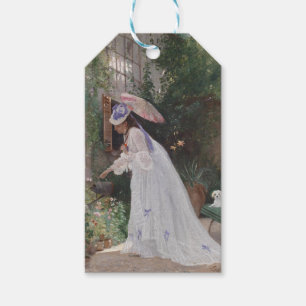 Étiquettes-cadeau Une dame dans un jardin qui soigne ses fleurs avec