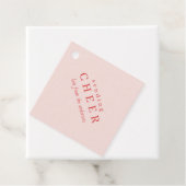 Étiquettes cadeaux de Noël rose rayé (En situation)