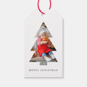 Étiquettes de Noël minimalistes avec fond de sapin