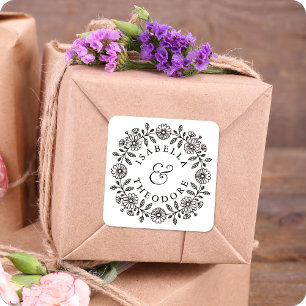 Étiquettes de nom de couple de couronne florale dé