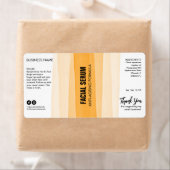 Étiquettes de sérum à goutte orange en encre rayée (En situation)