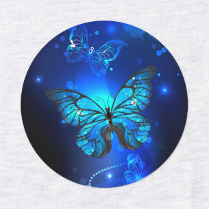 Étiquettes Morpho Butterfly in the Dark Background