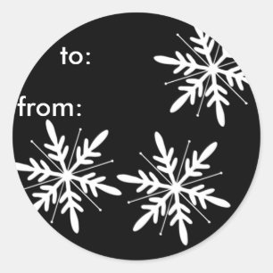 Étiquettes noires et blanches de cadeau de flocon