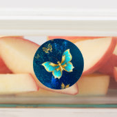 Étiquettes Papillons d'or sur un Arrière - plan bleu (Apposé)