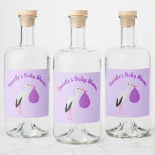 Étiquettes Pour Bouteilles De Liqueur Bébé Cigogne Baby Shower violet et genre neutre