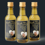 Étiquettes Pour Bouteilles De Vin Black and Gold 50th Birthday Photo Merci<br><div class="desc">Créez des étiquettes de mini bouteille de vin en Merci noir et or pour la fête du 50ème anniversaire avec un design élégant qui comprend une photo en forme de coeur, le nom, et le cinquantième jalon. Utilisez le modèle pour taper votre prénom et votre nom et ajouter une photo....</div>
