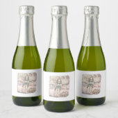 ÉTIQUETTES POUR BOUTEILLES DE VIN MOUSSEUX さなむさじ  寝室のピンクのベッドに腰かけて目を閉じている素足の女性のイラスト (Bouteilles)