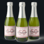 Étiquettes Pour Bouteilles De Vin Mousseux 50th birthday party rose gold name diamonds<br><div class="desc">An elegant, glamorous and girly 50th birthday label. A rose gold, blush pink colored background with faux golden diamond sprinkle and a dark rose gold frame. Personalize and add a name, age 50 and a date. Date of birth or the date of the party. Dark rose gold and gray colored...</div>