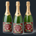 Étiquettes Pour Bouteilles De Vin Mousseux Red Christmas Wreath Custom Company Logo Party<br><div class="desc">Ce étiquette de champagne de Noël de la belle entreprise est fait sur mesure avec votre logo d'entreprise dans une couronne de fraise saint festive avec l'enveloppe de guirlande d'or sur un arrière - plan rouge. Étiquettes de vacances contemporains pour votre client ou employé d'entreprise présente.</div>
