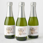 Étiquettes Pour Bouteilles De Vin Mousseux Woman 50 And Fabulous 50th Birthday<br><div class="desc">This 50th Birthday sparkling wine label features a pink and gold watercolor splash and a modern chic font combination. With its girly vibes, it is perfect for a modern chic woman. Do you need it for a different age? No problem, it can be personalized by clicking the "PERSONALIZE" button and...</div>
