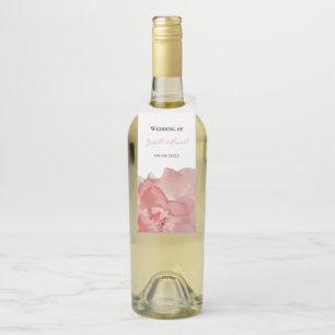 Étiquettes Pour Bouteilles Table élégant pour invités avec rose florale corai