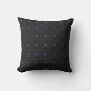 Étoile bleue en 12 points sur coussin noir