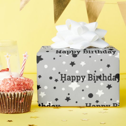 Étoiles d'anniversaire sur papier cadeau gris (Fête d'anniversaire)