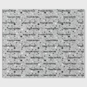 Étoiles d'anniversaire sur papier cadeau gris (Plat)