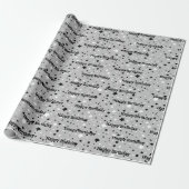 Étoiles d'anniversaire sur papier cadeau gris (Déroulé)